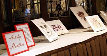 art show display at Champs 08 benefit