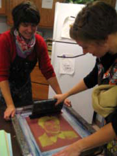 teachers demonstrate silk screening