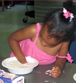 girl with hand in slime