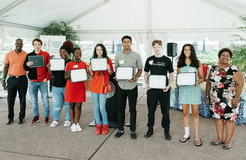 HTLA awardees with their certificates under the outdoor tent at Phipps.